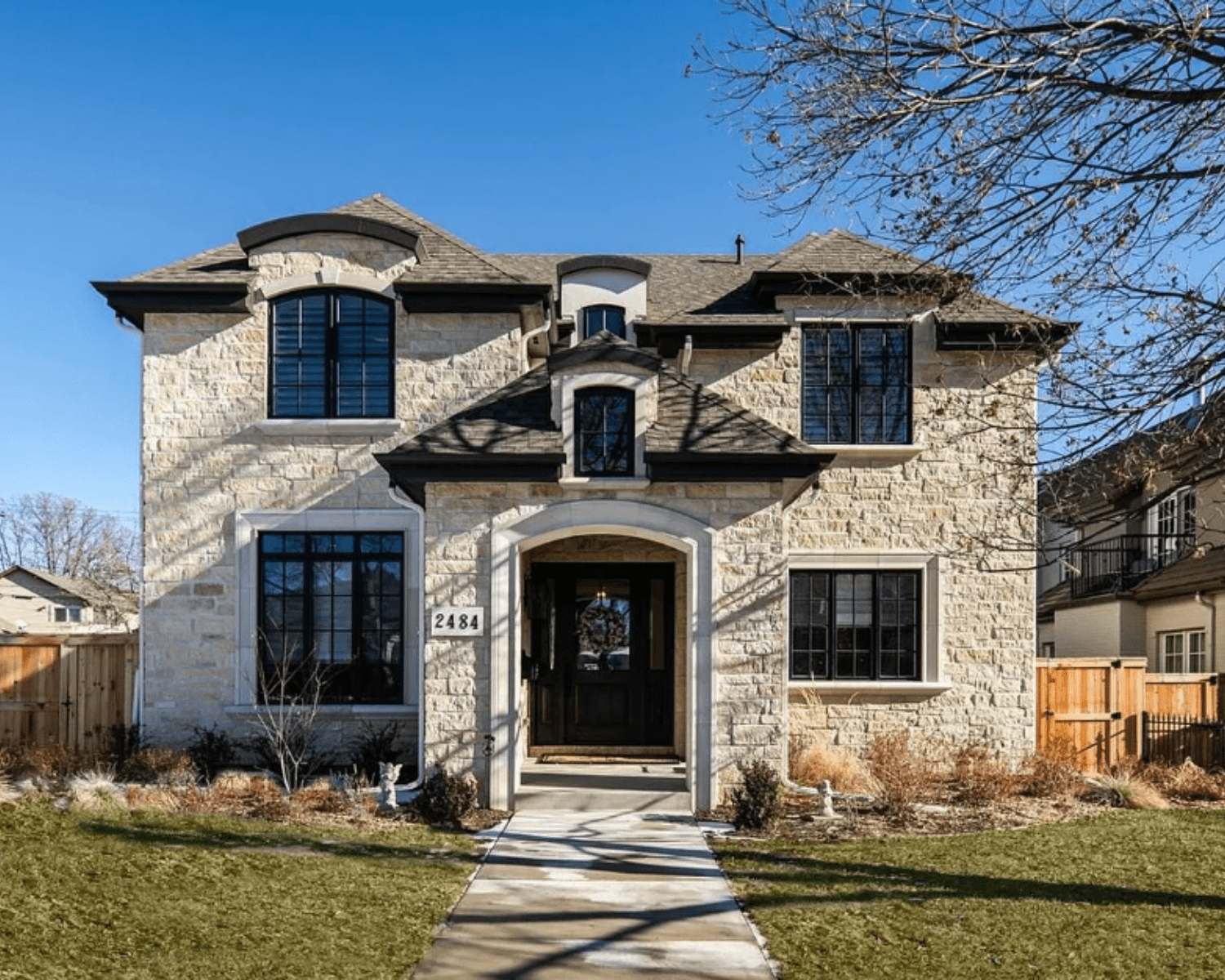 2484-S-MADISON-ST-DENVER-CO Image of a modern stone two-story luxury home.