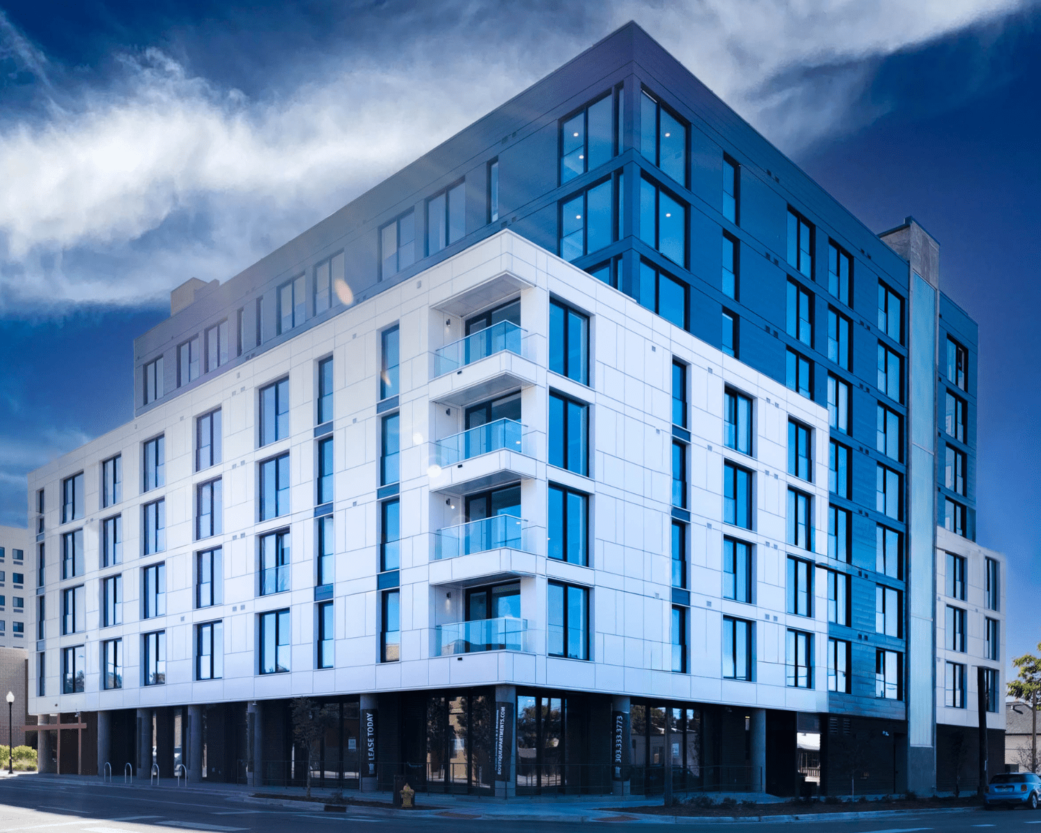 ART-DISTRICT-LOFTS-DENVER Image of the Art District Lofts boxy and modern eight-story exterior with glass balconies.