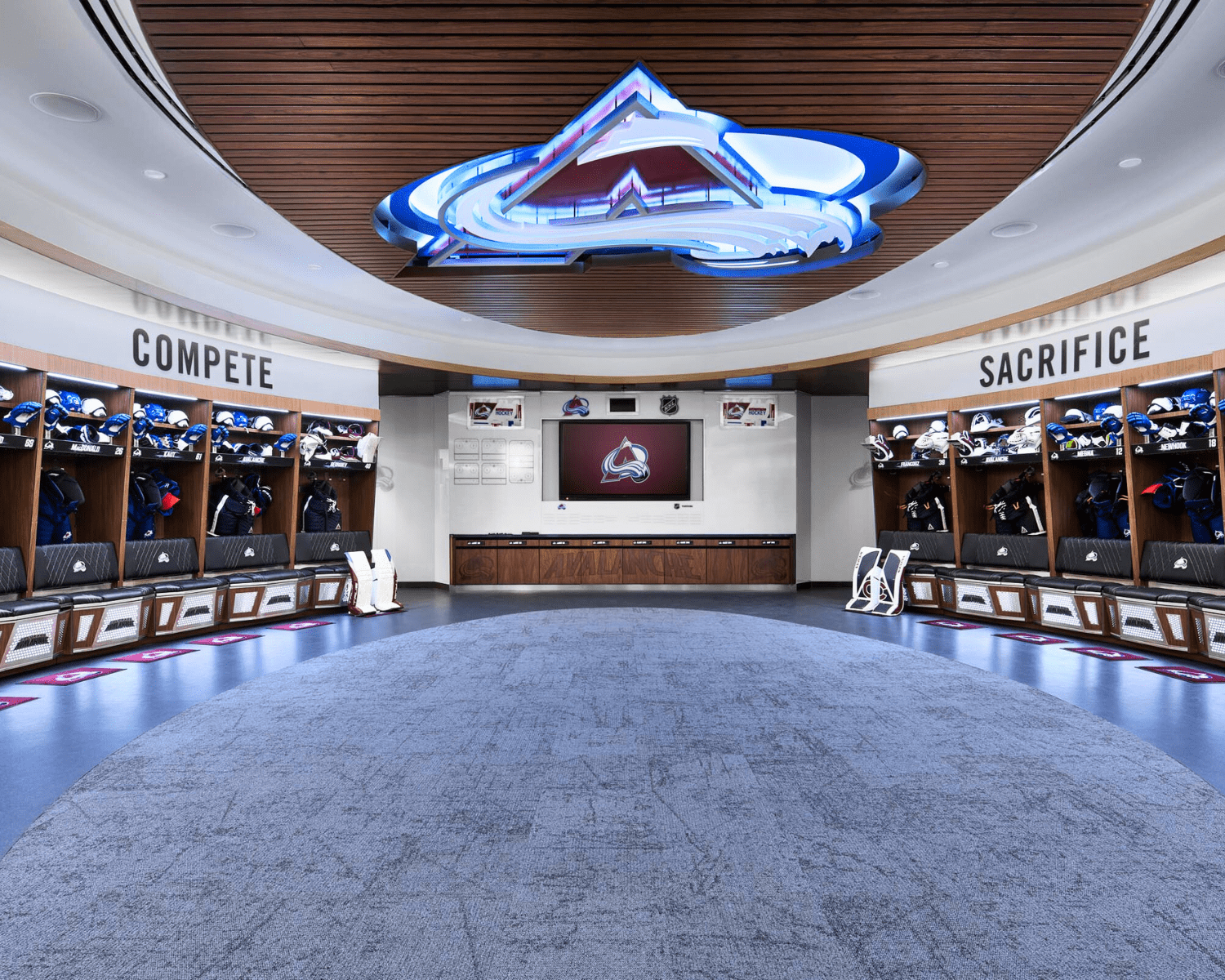 AVALANCHE-LOCKER-ROOM Image of the Colorado Avalanche locker room interior with large logo.