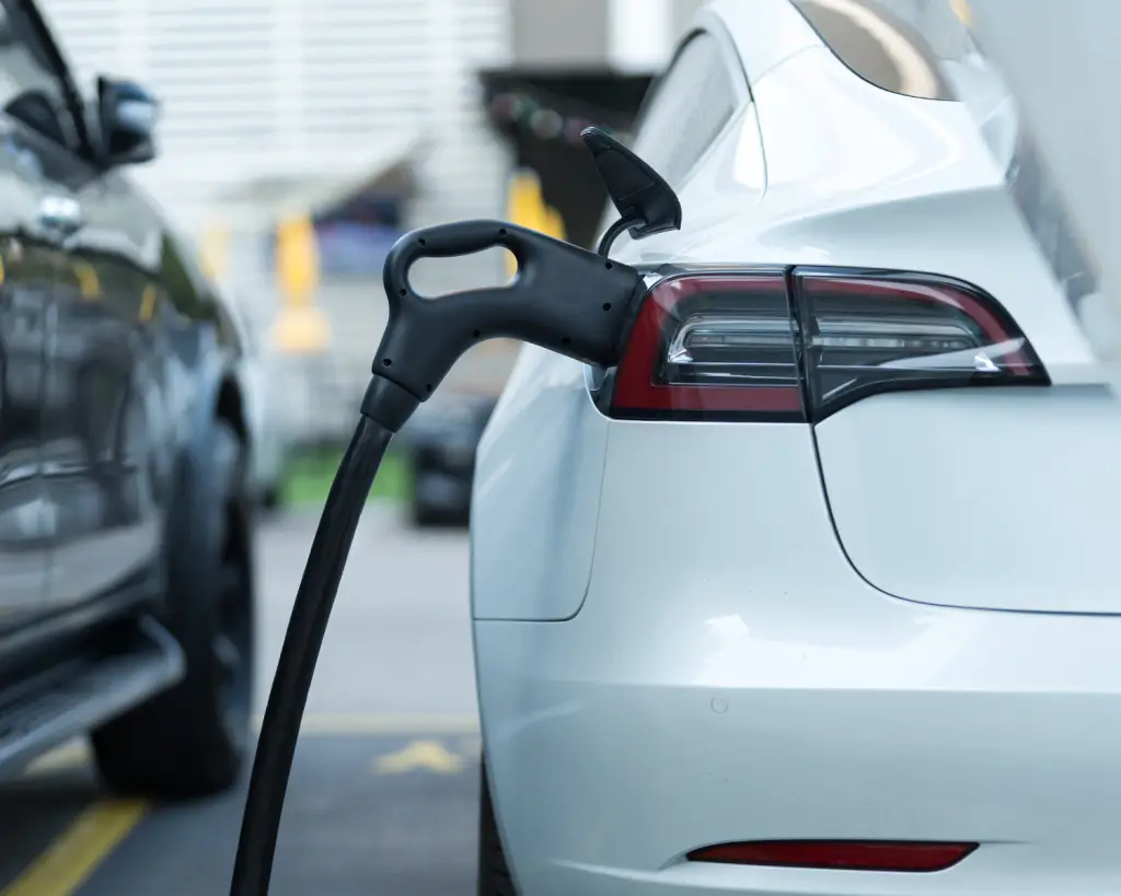 Image of a electric vehicle on charger.