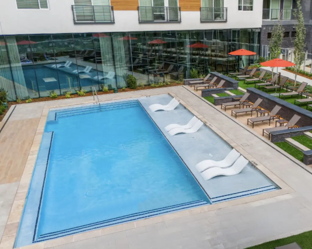 Image of an outdoor pool with loungers in Colorado.