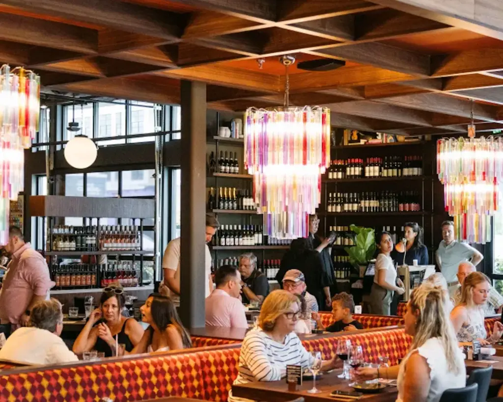 Image of Postino Ballantyne interior with guests.
